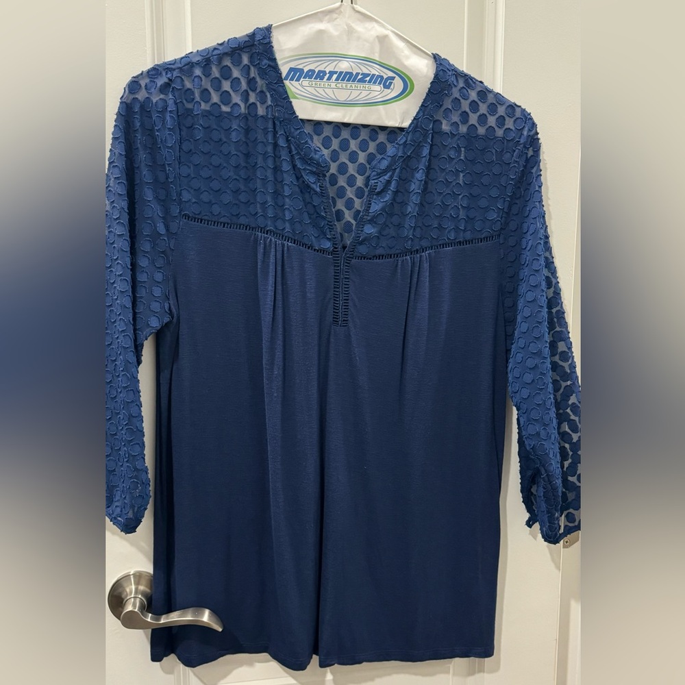 Unique top with sheer and solid design